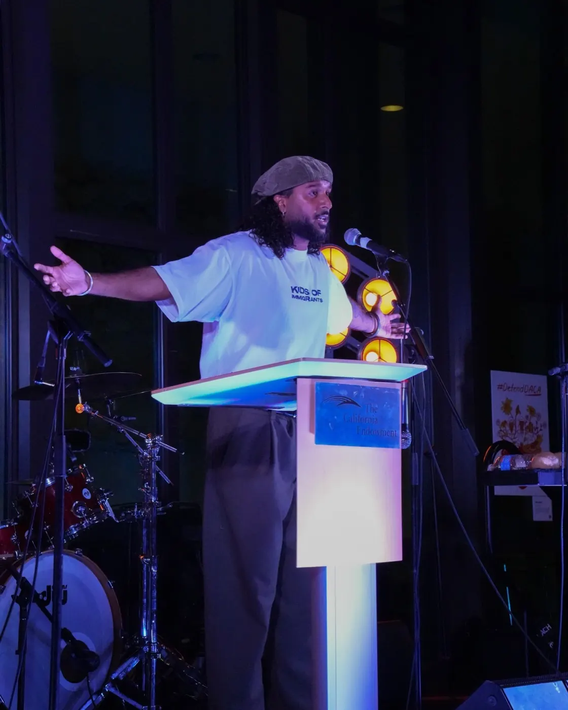 A partner speaks to the gathering