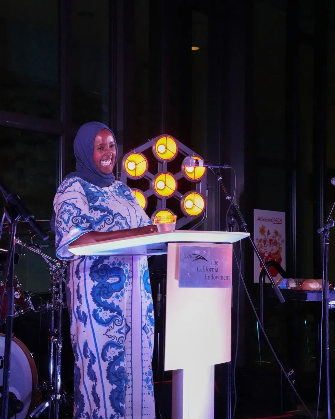 A grantee partner at the microphone